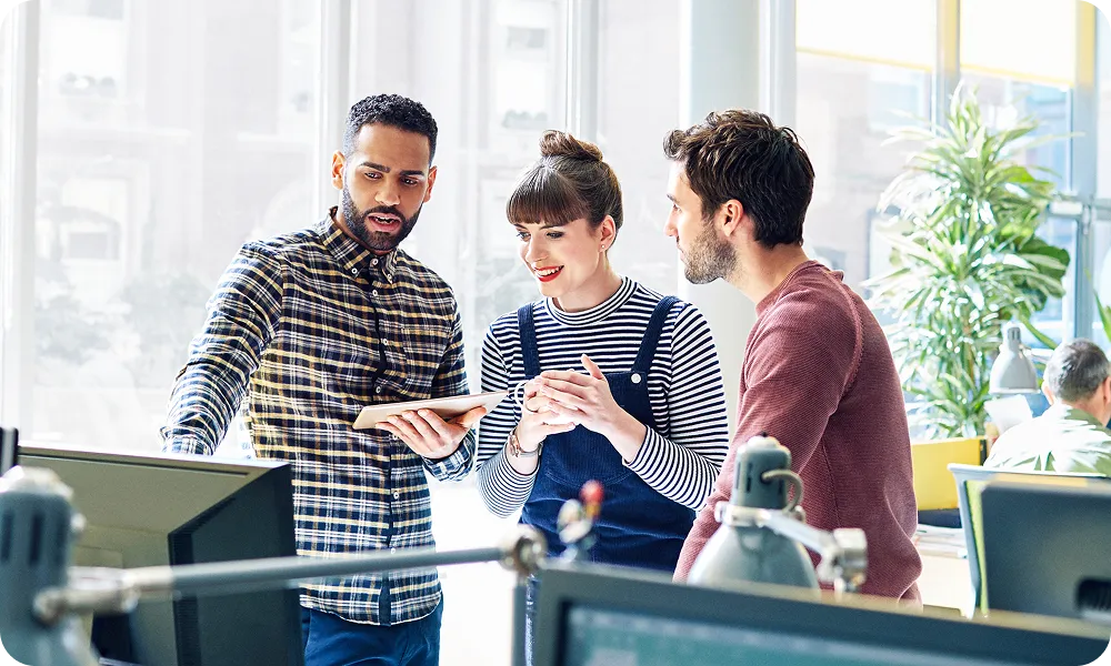 man with red long sleeve shirt with hand on chin
